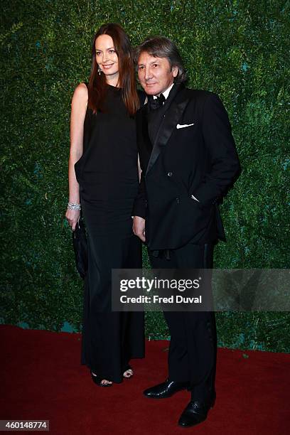 Ame Austin and Leon Max attends the 60th London Evening Standard Theatre Awards at London Palladium on November 30, 2014 in London, England.