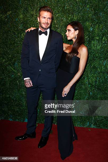 David Beckham and Victoria Beckham attends the 60th London Evening Standard Theatre Awards at London Palladium on November 30, 2014 in London,...