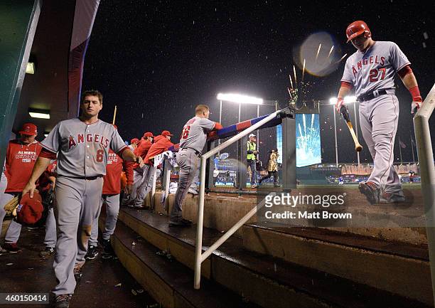 David Freese and Mike Trout of the Los Angeles Angels of Anaheim walk towards the clubhouse after losing game 3 of the American League Division...