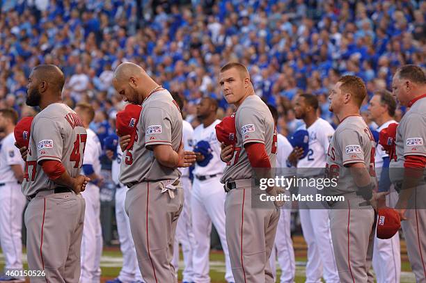 Mike Trout of the Los Angeles Angels looks towards the crowd during the National Anthem before game 3 of the American League Division Series against...