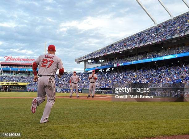 Mike Trout of the Los Angeles Angels of Anaheim takes the field before game 3 of the American League Division Series against the Kansas City Royals...