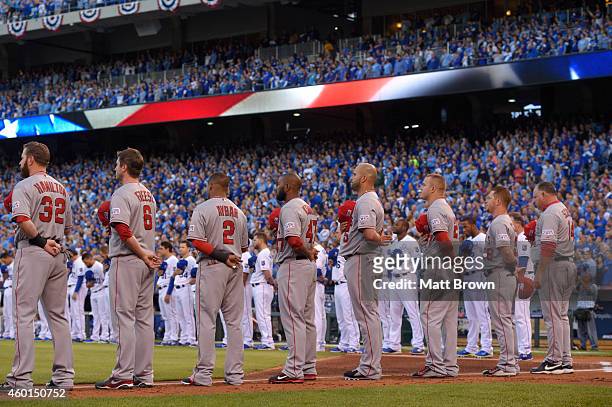 The Los Angeles Angels of Anaheim line up for the National Anthem before game 3 of the American League Division Series against the Kansas City Royals...