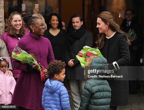 Catherine, Duchess of Cambridge and New York City Mayor Bill de Blasio's wife Chirlane McCray greet guests at Northside Center for Child Development...