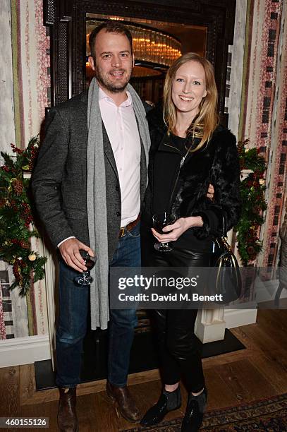 Jack Dyson and Jade Parfitt attend a VIP screening of "St. Vincent" hosted by Poppy Delevingne at The Covent Garden Hotel on December 8, 2014 in...