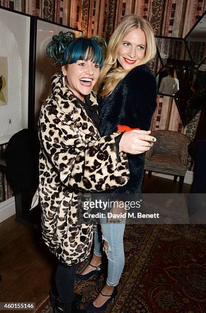 Jaime Winstone and Poppy Delevingne attend a VIP screening of "St. Vincent" hosted by Poppy Delevingne at The Covent Garden Hotel on December 8, 2014...