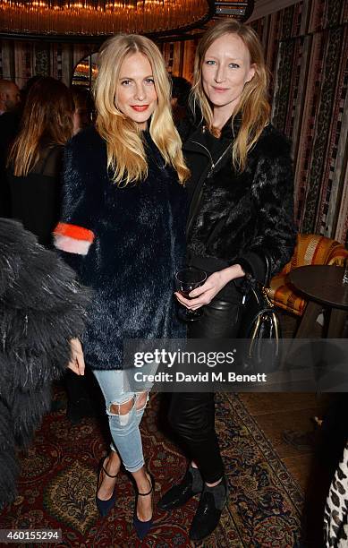 Poppy Delevingne and Jade Parfitt attend a VIP screening of "St. Vincent" hosted by Poppy Delevingne at The Covent Garden Hotel on December 8, 2014...