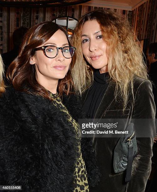 Natalie Imbruglia and guest attend a VIP screening of "St. Vincent" hosted by Poppy Delevingne at The Covent Garden Hotel on December 8, 2014 in...