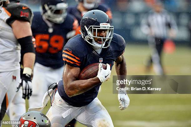 Safety Ryan Mundy of the Chicago Bears runs with the ball during the NFL game against the Tampa Bay Buccaneers on November 23, 2014 at Soldier Field...
