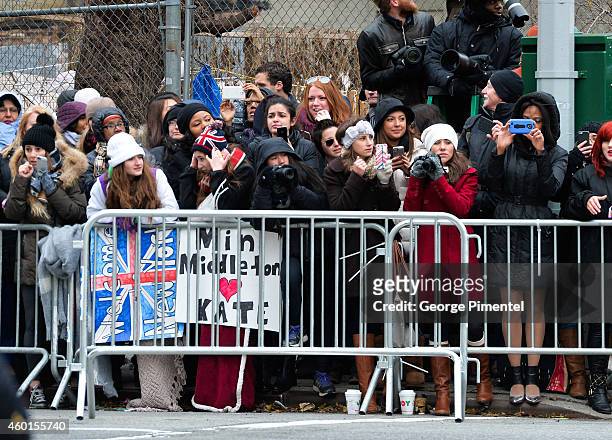 Crowds gather to view Catherine, Duchess of Cambridge and New York City Mayor Bill de Blasio's wife Chirlane McCray at Northside Center for Child...