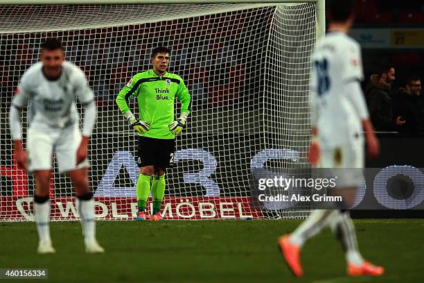 Goalkeeper Stefan Ortega of Munich reacts after Jakub Sylvestr of Nuernberg scored his team's second goal during the Second Bundesliga match between...