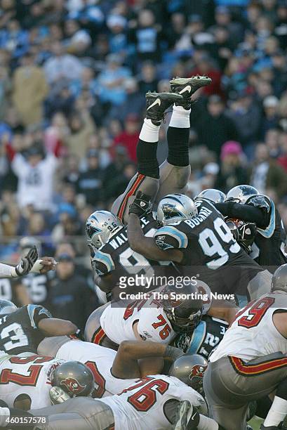 Brentson Buckner of the Carolina Panthers makes a tackle during a game against the Tampa Bay Buccaneers on December 11, 2005 at the Bank of America...