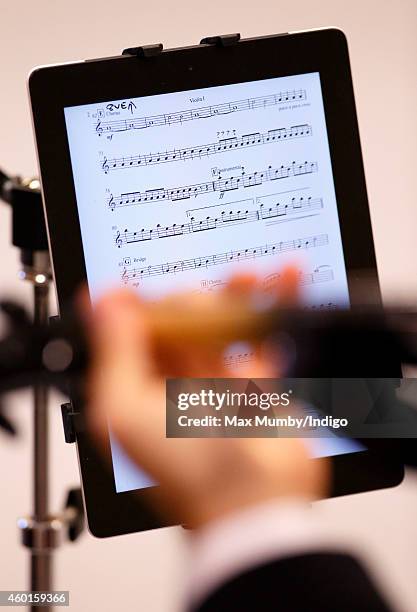 Violinist of The Countess of Wessex's String Orchestra using an iPad rather than sheet music, seen during a visit by Sophie, Countess of Wessex to...