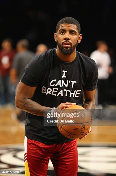 Kyrie Irving of the Cleveland Cavaliers wears an "ICan't Breathe" shirt during warmups before the game against the Brooklyn Nets during their game at...
