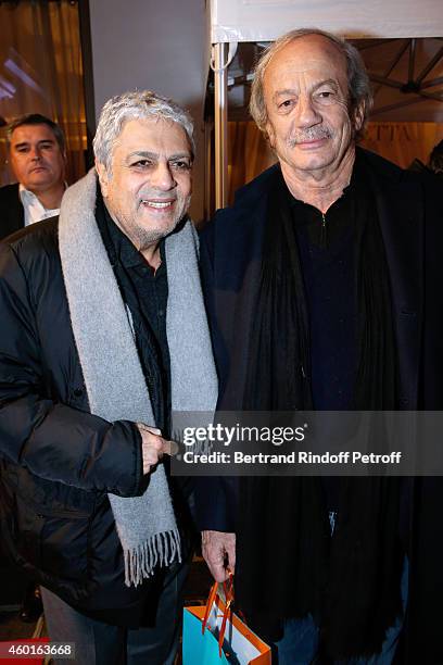 Singer Enrico Macias and actor Patrick Chesnais attend the Sarah Guetta Party in Paris for the first anniversary of the Hairdressing salon Sarah...