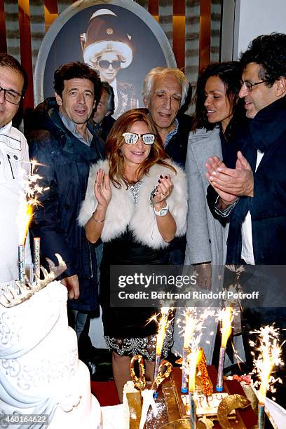 Singer Patrick Bruel, Sarah Guetta, Actor Gerard Darmon and TV host Laurence Roustandjee attend the Sarah Guetta Party in Paris for the first...