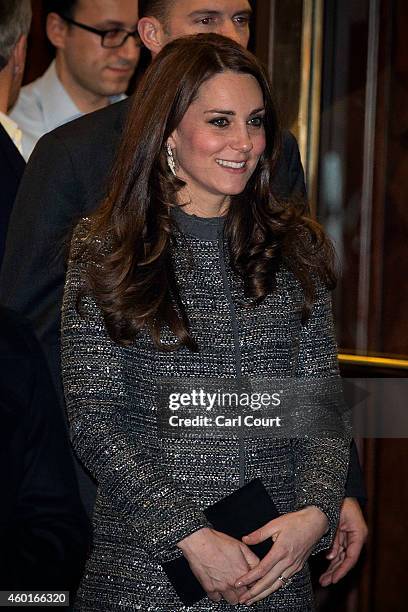 Catherine, Duchess of Cambridge, leaves after attending the conservation reception at the British Consul General's Residence on December 8, 2014 in...