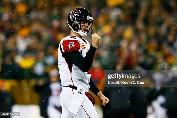 Matt Ryan of the Atlanta Falcons reacts in the first quarter against the Green Bay Packers at Lambeau Field on December 8, 2014 in Green Bay,...