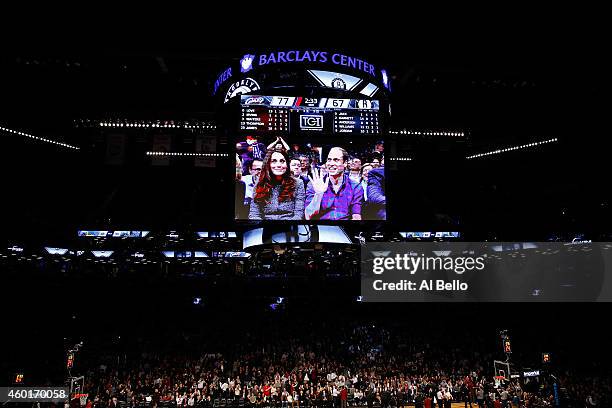 Detailed view of Prince William, Duke of Cambridge and Catherine, Duchess of Cambridge on the Jumbotron duirng the game between the Cleveland...