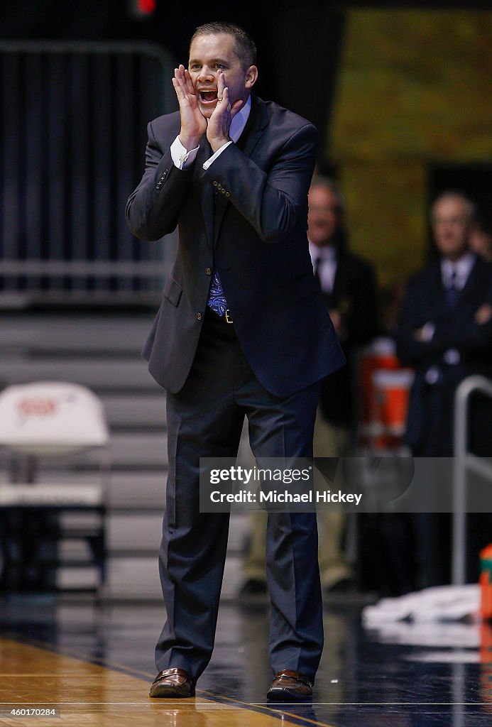 Butler Indiana Coach Interim head coach Chris Holtmann of the Butler Bulldogs directs his ...