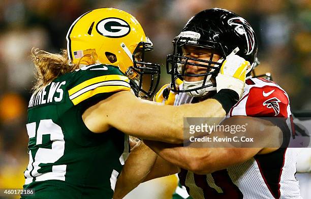 Clay Matthews of the Green Bay Packers defends against Jake Matthews of the Atlanta Falcons in the third quarter at Lambeau Field on December 8, 2014...
