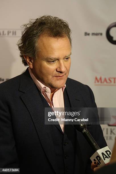 Hugh Bonneville attends Downton Abbey's Season Five Cast Photo Call at Millenium Hotel on December 8, 2014 in New York City.