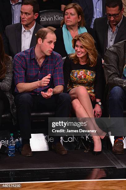 Prince William, Duke of Cambridge and President of ONEXIM Sports and Entertainment Holding USA Irina Pavlova are seen courtside as they attend the...