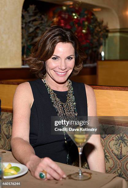 Star LuAnn de Lesseps and close friends enjoy an intimate holiday celebration at Bonefish Grill on December 8, 2014 in New York City.