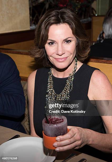 Star LuAnn de Lesseps and close friends enjoy an intimate holiday celebration at Bonefish Grill on December 8, 2014 in New York City.