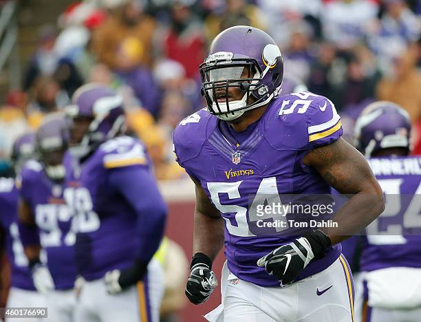 Jasper Brinkley of the Minnesota Vikings runs off the field during an NFL game against the New York Jets at TCF Stadium, on December 7, 2014 in...