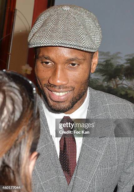 Football player Didier DrogbaÊand awarded conductor Zahia Ziouani's twin sister Fettouma Ziouani attend the 'Prix De La Femme D'Influence 2014'...