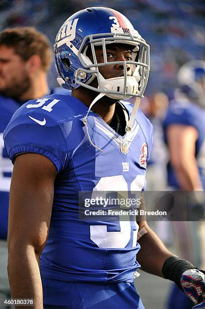 Zack Bowman of the New York Giants watches from the sideline during the second half of a game against the Tennessee Titans at LP Field on December 7,...