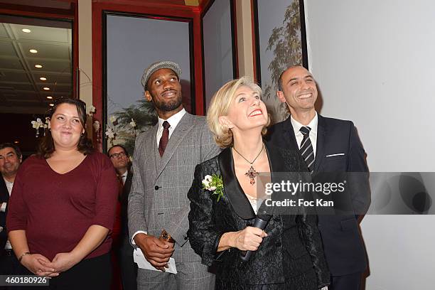 Prix De La Femme D'Influence Coup de Coeur ' conductor Zahia Ziouani's twin sister Fettouma Ziouani, Didier Drogba, Patricia Chapelotte and Jean...