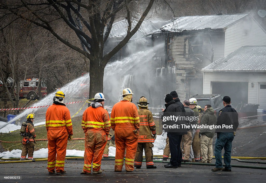 The scene of a small plane crash into a residential neighborhood, in Gaithersburg, MD.