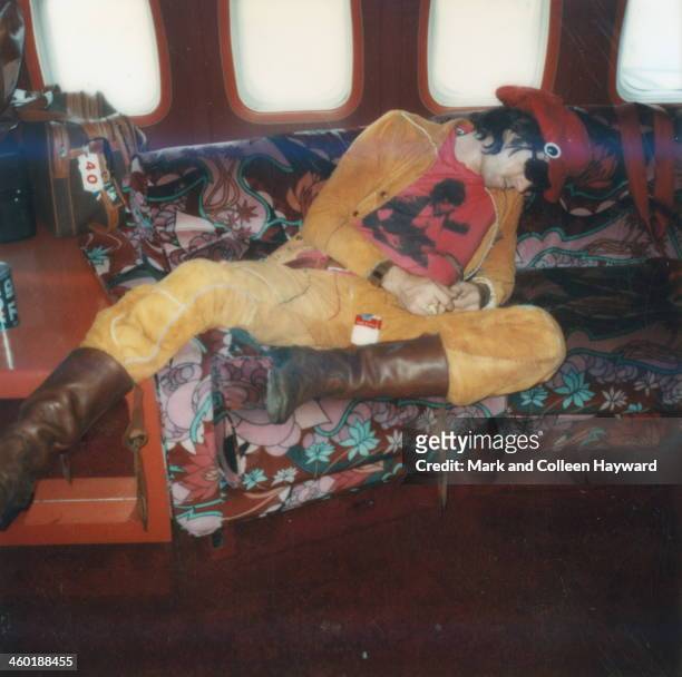 Circa 1975: Polaroid image of Keith Richards, guitarist with The Rolling Stones posed on an aeroplane circa 1975.
