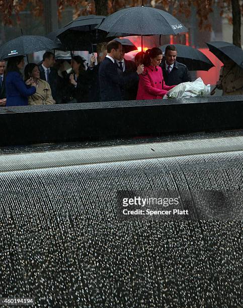 Prince William, Duke of Cambridge and Catherine, Duchess of Cambridge, lay a wreath at one of the reflecting pools at the National September 11...