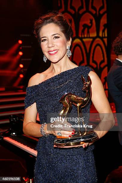 Princess Mary of Denmark poses with her award after the Bambi Awards 2014 show on November 14, 2014 in Berlin, Germany.