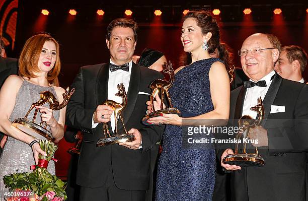 Josefine Preuss, Francis Fulton-Smith, Princess Mary of Denmark and Hans Joachim Heist pose with their awards after the Bambi Awards 2014 show on...
