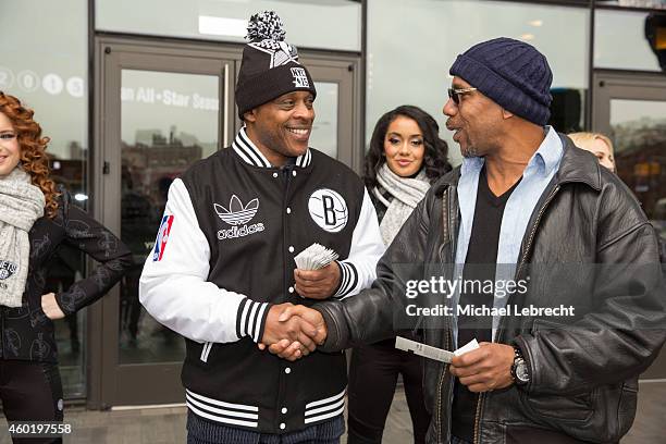 Tiny Archibald hands out All Star Tickets with Brooklynettes and poses for pictures with fans on December 5, 2014 at the Barclays Center in the...