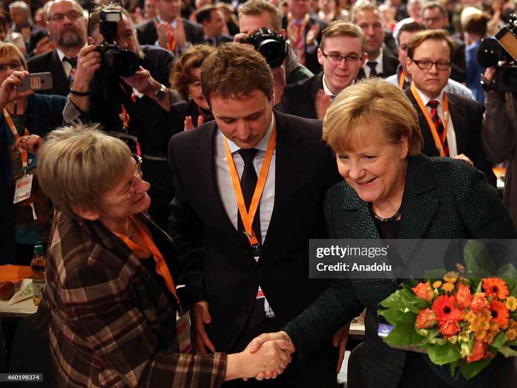 Germany's Merkel re-elected as CDU party leader