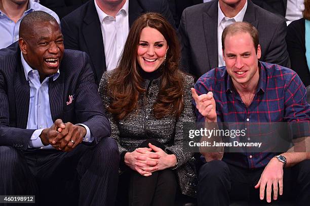 Dikembe Mutombo, Catherine, Duchess of Cambridge and Prince William, Duke of Cambridge attend the Cleveland Cavaliers vs. Brooklyn Nets game at...