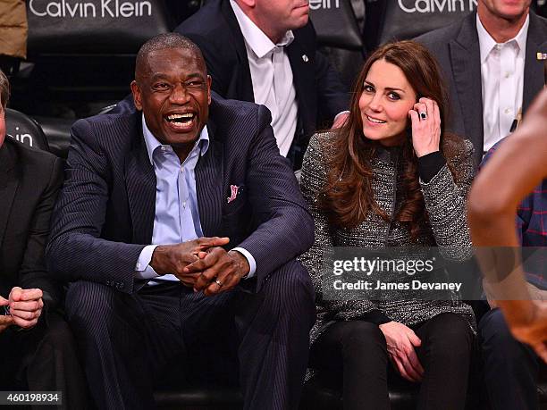 Dikembe Mutombo and Catherine, Duchess of Cambridge attend the Cleveland Cavaliers vs. Brooklyn Nets game at Barclays Center on December 8, 2014 in...