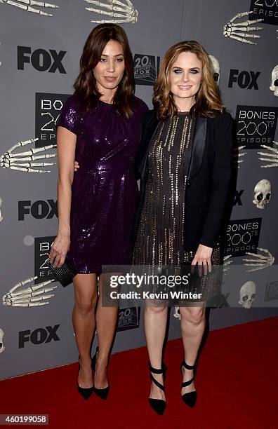 Actresses Michaela Conlin and Emily Deschanel arrive at Fox TV's "Bones" 200th Episode Celebration at Herringbone Mondrian on December 8, 2014 in...