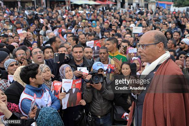 Tunisian presidential candidate Moncef Marzouki gives a speech during his meeting with people as a part of his election campaign for the presidential...
