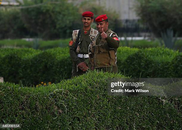 Iraqi soldiers stand outside of the Ministry of Defence during a visit from U.S. Secretary of Defense Chuck Hagel, December 9, 2014 in Baghdad, Iraq....