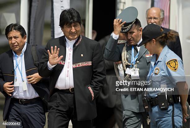Bolivian President Evo Morales , accompanied by his Foreign Minister David Choquehuanca , heads to a press conference during the UN COP20 and CMP10...