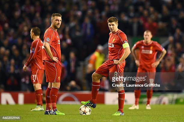 Dejected Liverpool players Rickie Lambert and Steven Gerrard look on after conceding the opening goal during the UEFA Champions League group B match...