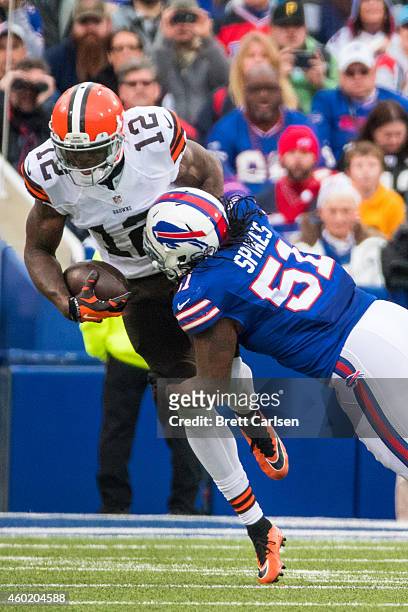 Brandon Spikes of the Buffalo Bills tackles Josh Gordon of the Cleveland Browns on November 30, 2014 at Ralph Wilson Stadium in Orchard Park, New...
