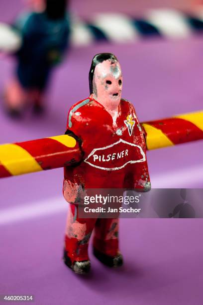 Table football player figure, with a painted red shirt, is seen inside the table football box on the street of Pesillo, a small village in the...