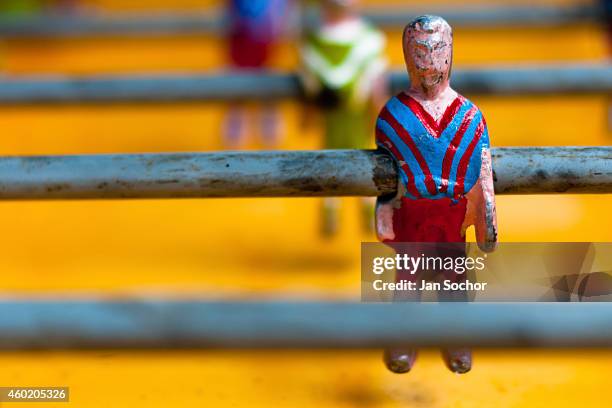 Table football player figure, with a painted red and blue shirt, is seen inside the table football box on the street of Olmedo, a small village in...