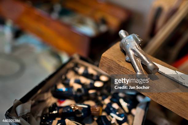 An unpainted figure of a player seen at a table football workshop on March 03, 2012 in Quito, Ecuador. Table football, also known as futbolin in...